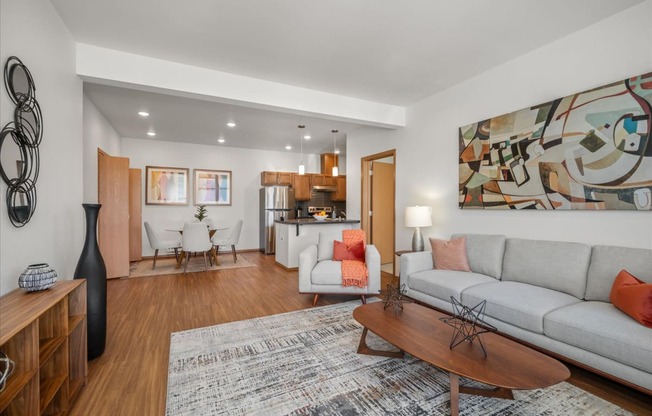 a living room with a couch and a table