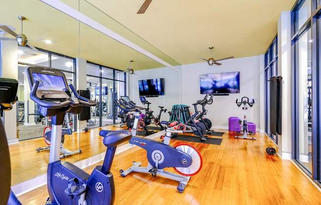 fitness center with cardio equipment at Berkshire Coral Gables apartments