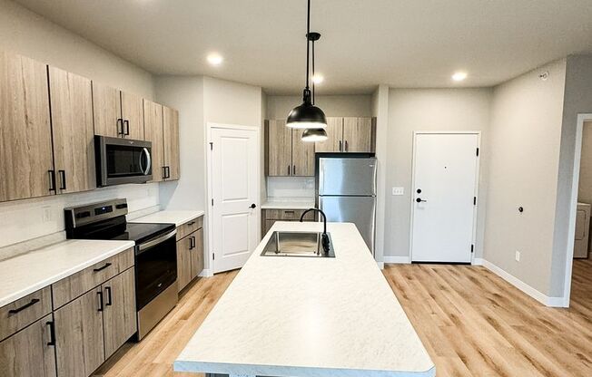 3 beds, 2 baths, 1,409 sqft, $1,975, Unit C301