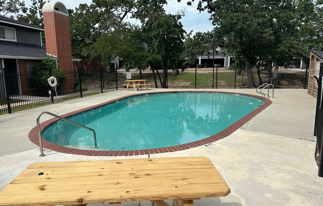 College Station - 2 bedroom / 2.5 bath Condo - 2 story with covered parking - Pool in your front yard.