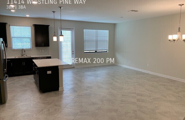 11414 WHISTLING PINE WAY