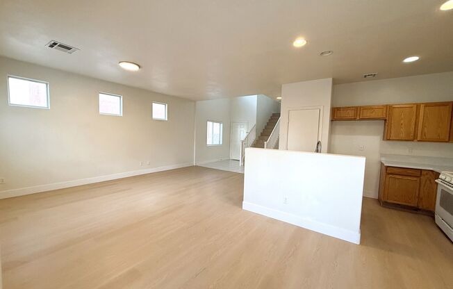 Open floor plan home with brand new vinyl plank flooring throughout! Bedroom & Bathroom downstairs!