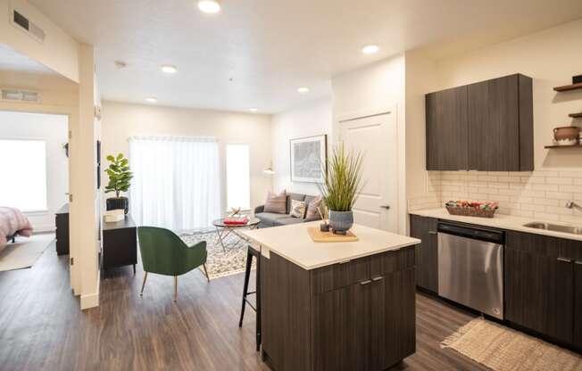 an open floor plan with a kitchen and living room