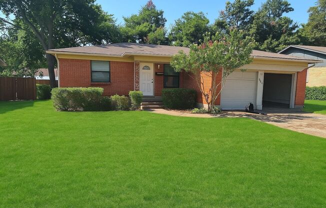 Inviting 3-Bedroom Brick Home with Spacious Yard & Modern Touches in Garland, TX