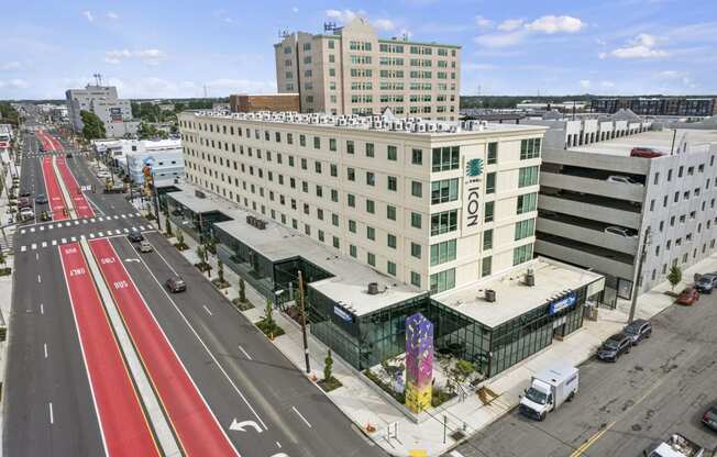 a large white building with a sign that says motel 6 on the side of it  at The Icon, Richmond, Virginia