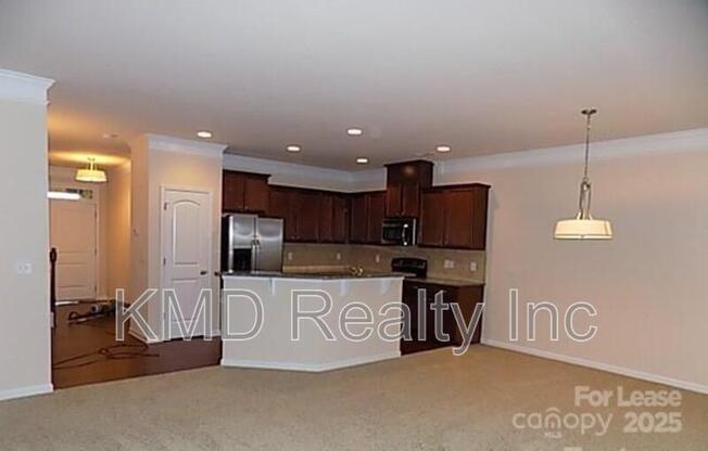9590 CAMBERLEY AVE NW