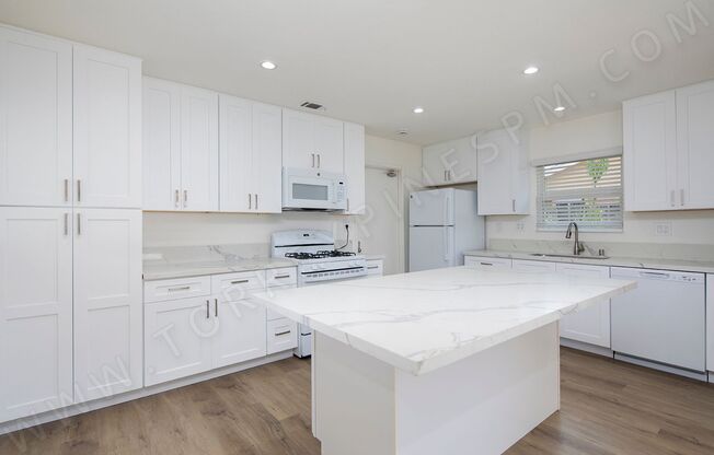 Spacious 4 Bedroom, 2 Bath Home with Private Yard and 2 Car Garage!