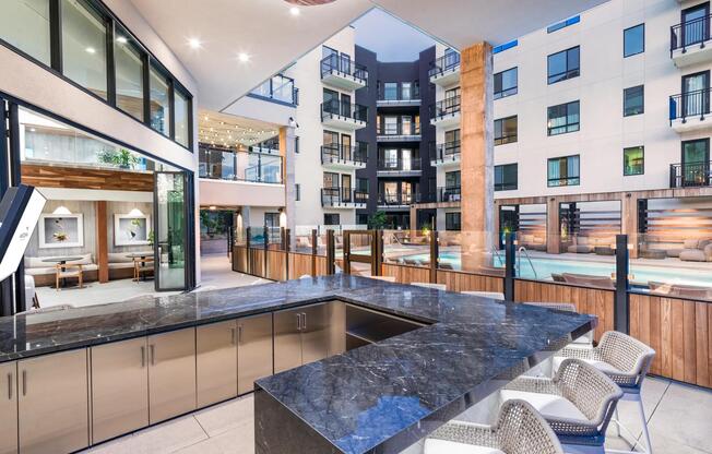 Imagine enjoying a meal at our outdoor kitchen, perfectly positioned right next to the pool.