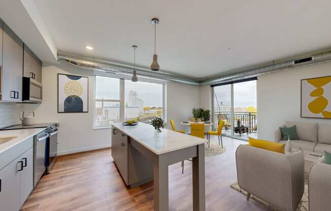a living room with a kitchen and a dining room