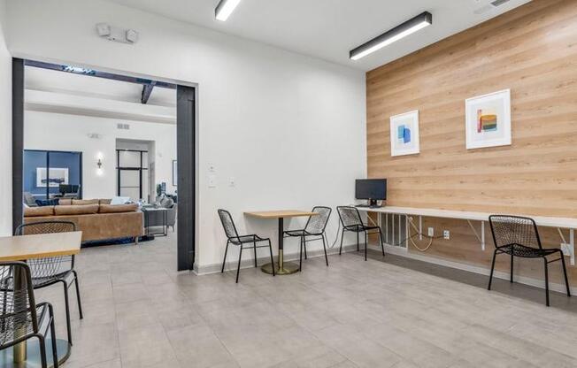 a living room with tables and chairs and a tv at Marina Point, Chattanooga, 37415