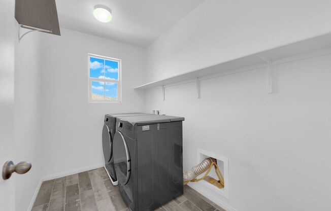 Stunning 4 bedroom 2.5 bathroom nestled in gaurd gated community