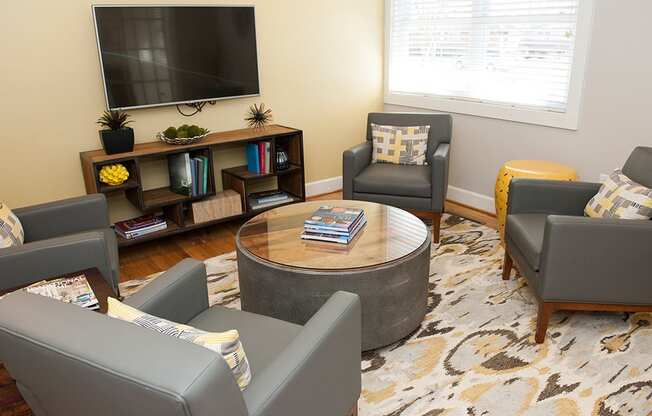 Living Area With TV at Glen Lennox Apartments, North Carolina, 27514