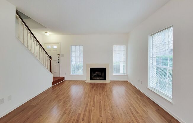 Beautiful two-story corner unit filled with natural light!