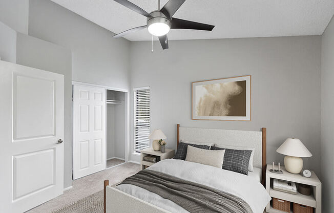 Model Bedroom with Carpet and Closet at The Meritage Apartments in Vallejo, CA.