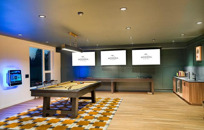 Gather with friends in Modera Shoreline’s game lounge, featuring billiards, large screens, and space to unwind just minutes from downtown Shoreline.