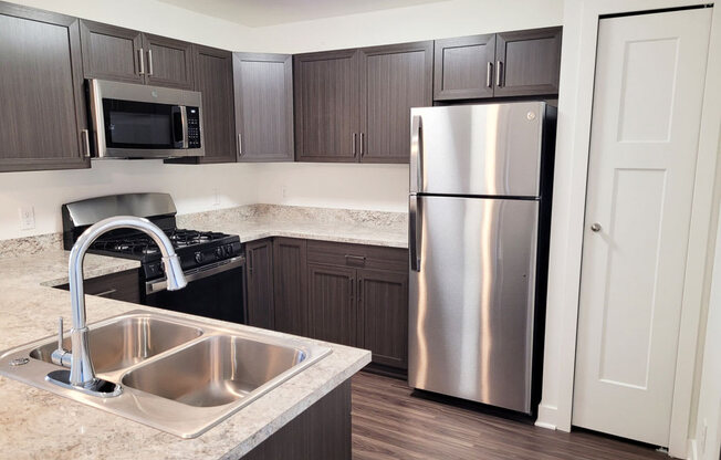 One Bedroom Modern Kitchen with Pantry at Trade Winds Apartment Homes, Elkhorn, NE
