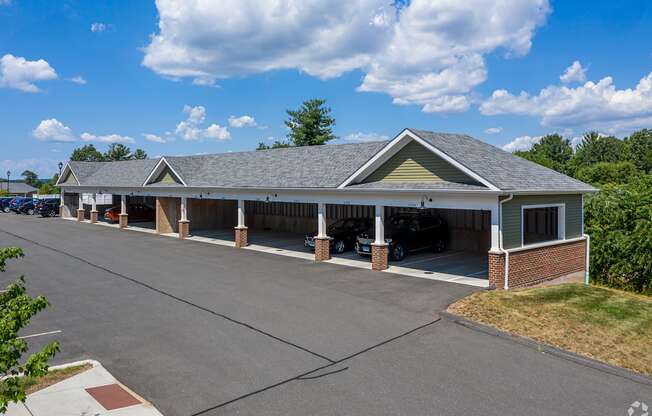 A building with a parking lot in front of it.