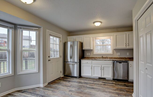 Quaint Ranch Style Home With Hardwood Flooring and Stainless Steel Appliances