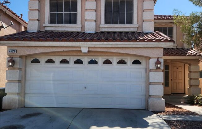 3-Bed, 2.5-Bath Pet-Friendly Home with Fenced Yard in Las Vegas
