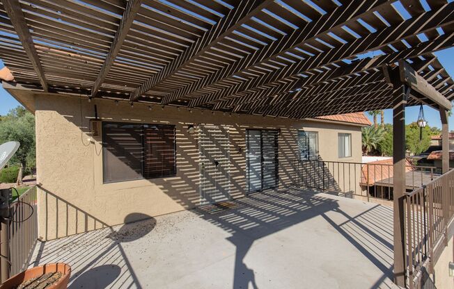 Two bedrooms on the second floor of henderson townhome with garage, granite counters and wood floors