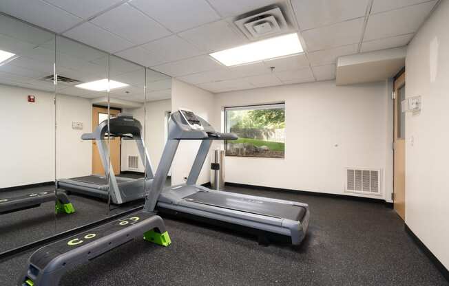 Fitness Center Featuring A Treadmill