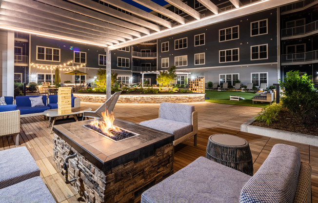 Courtyard at night at The Q | Apartments In Quincy, MA for Rent