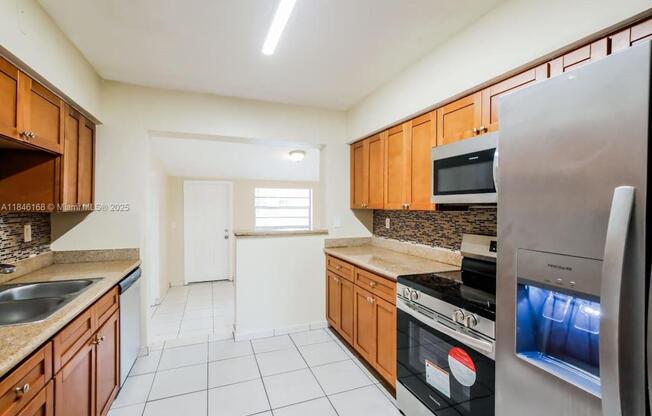 1120 NE 160 ST