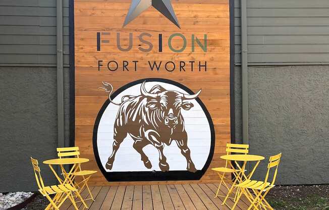 Fusion Fort Worth wooden board with a star and a bull on it.