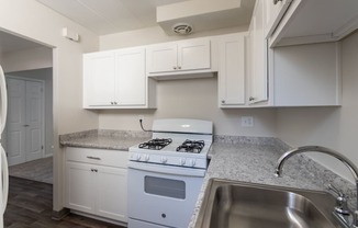 This is a photo of the kitchen in the 631 square foot, 1 bedroom/1 bath Montgomery floor plan at Colonial Ridge Apartments in the Pleasant Ridge neighborhood of Cincinnati, OH.