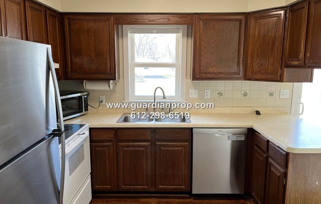 Shoreview House Available September 1st, Updated Full Bath, Updated Flooring, Large Fenced Yard, Oversized Garage