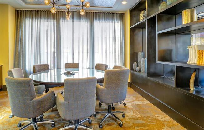 a conference room with a large table and chairs