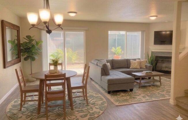 **$500 OFF THE 2ND MONTH'S RENT** Beautifully Remodeled 3 Bedroom Townhome w/ Garage, W/D, Fireplace, and Private Balcony & Patio!