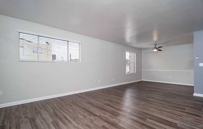 Carpeted Lounge Area with Ceiling Fan at Los Robles Apartments, Pasadena