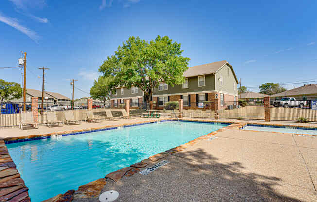 second pool with lounge seating  at Arbors Of Cleburne, Texas