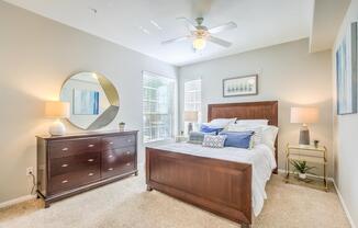 bedroom with cozy bed at Stone Canyon Apartments, Riverside, California