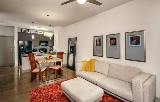 Spacious Living Room with Ceiling Fan at Apartments Cedar Springs