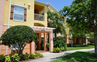 Cute 3/2 Condo in Horizons at Vista Lakes (Gated) with Updated Flooring and Front Parking Space