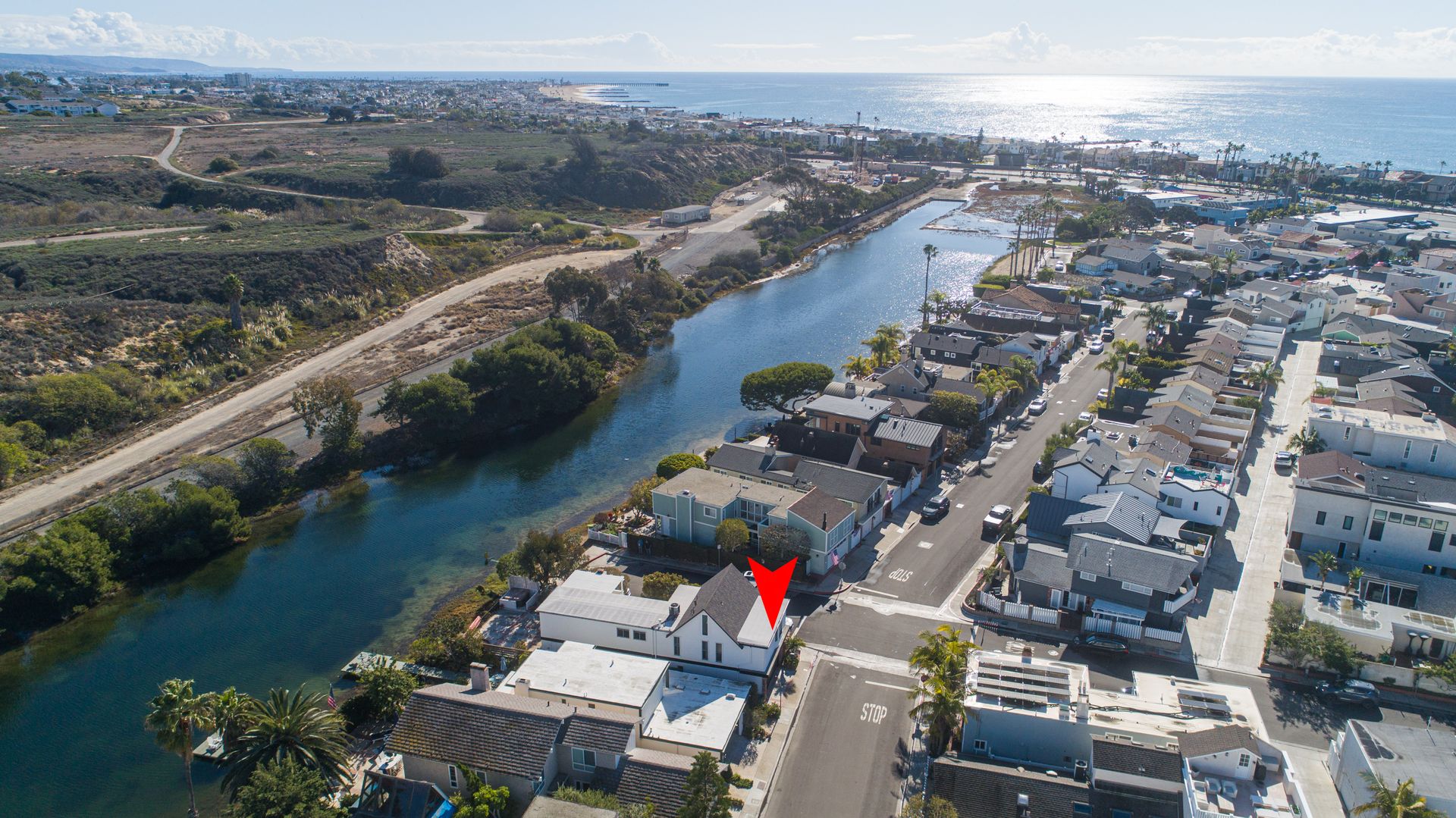 NEWLY REMODELED SINGLE-FAMILY HOME ON THE CANAL FRONT IN NEWPORT SHORES