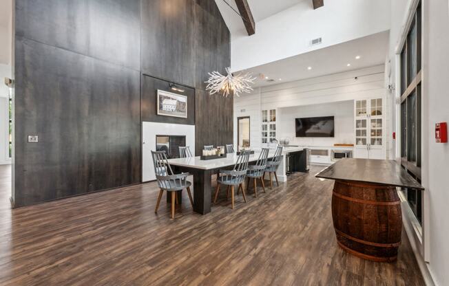 a dining room with a table and chairs and a fireplace