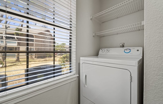 a washer and dryer are available in the laundry room