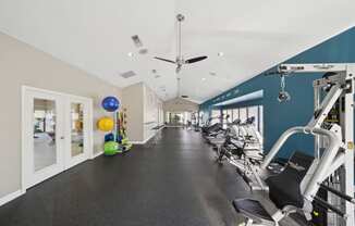 View of entire fitness room at Davenport Apartments in Dallas, TX