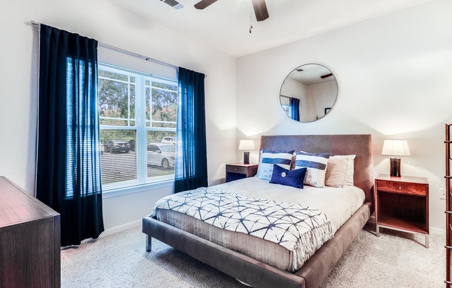 a bedroom with a bed and nightstand at Plantation Crossing, Louisiana