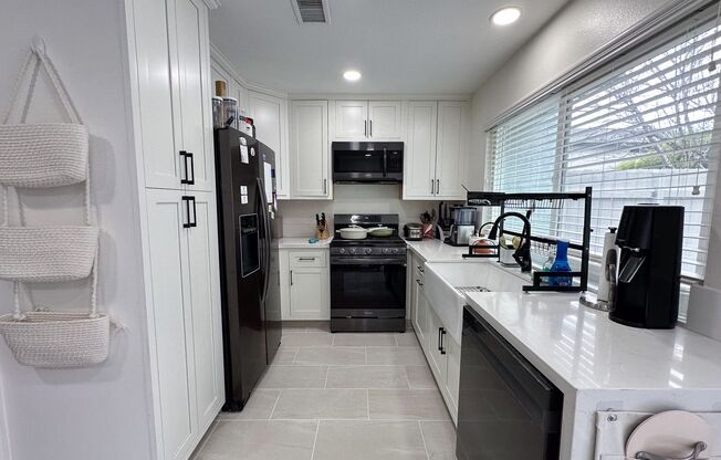 Remodeled 2 Bedroom 1.5 Bath Attached Townhouse,