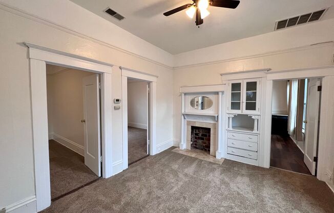 Lovely two bedroom with bonus room, washer/dryer hookups, and parking!