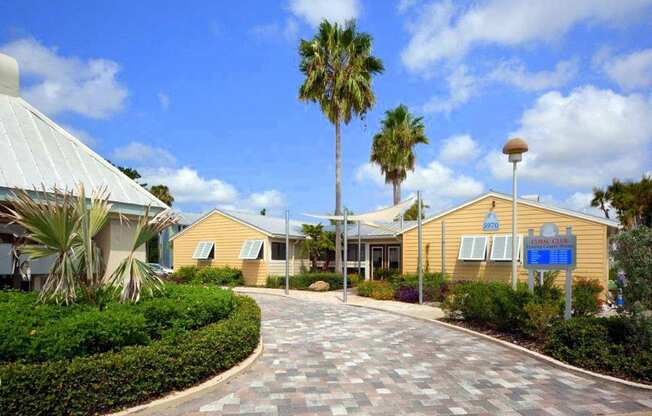 Landscaping and palm trees at Coral Club, Bradenton