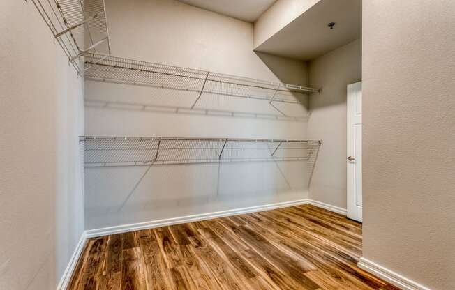 Large walk-in closets with shelving in select bedrooms