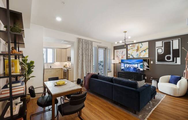 a living room with a couch and a table