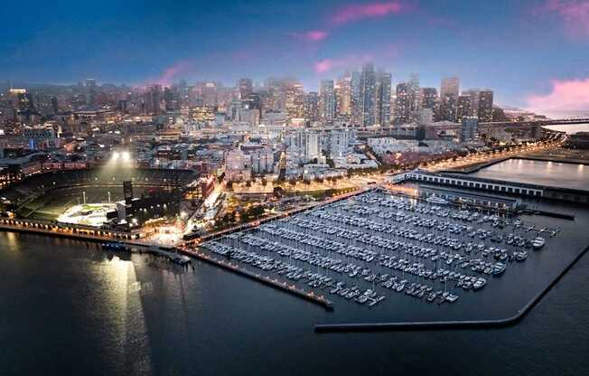 A marina filled with lots of boats at dusk.