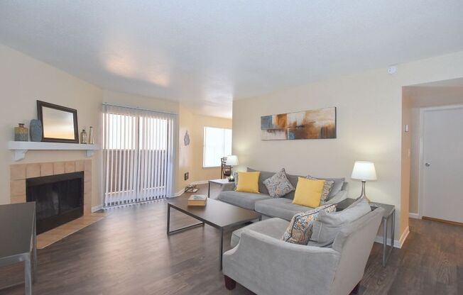 a living room with a couch and a coffee table