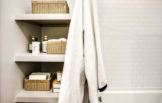 Studio, one, and two-bedroom apartment homes with stainless steel appliances, quarts countertops, designer cabinetry, large kitchens, luxury vinyl plank flooring, high vaulted ceilings, high-end lighting, in-unit washer and dryer, and energy efficient windows at Fireside at Waukee in Waukee, IA